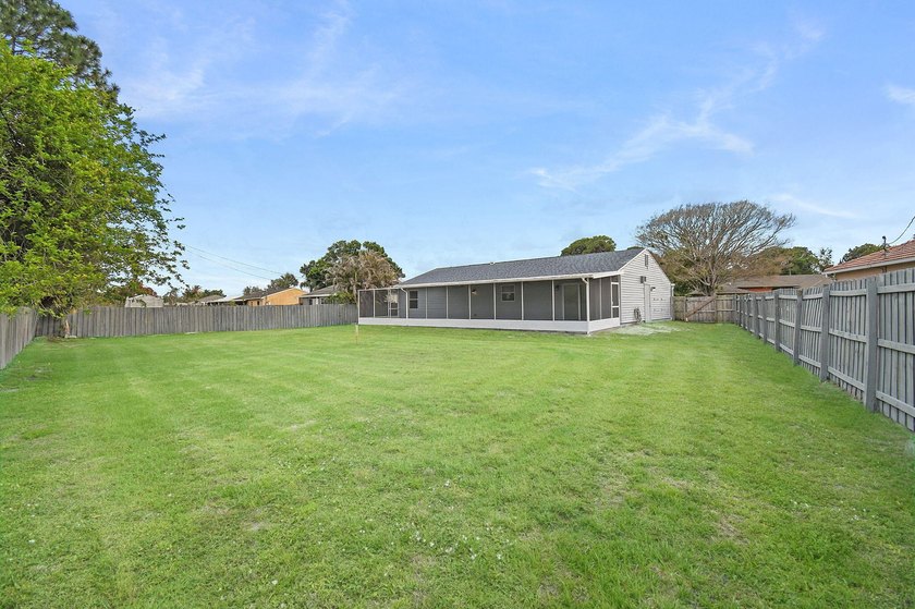 Fully renovated 3-bedroom, 2-bath home featuring a desirable - photo 38