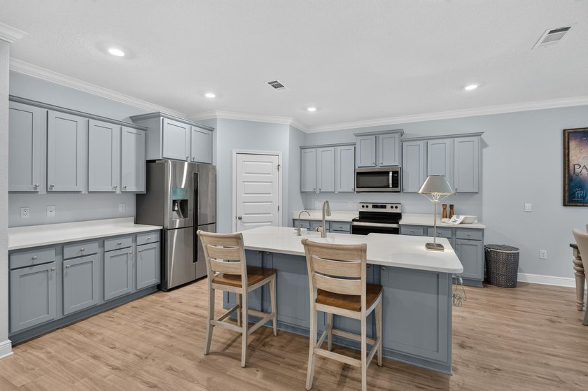 Nestled within the highly sought-after Treasure Cove community - photo 7