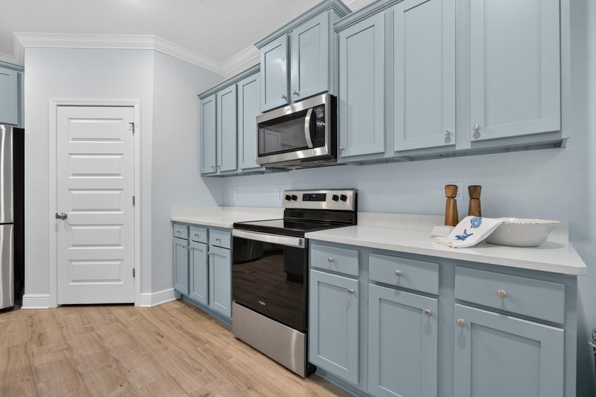 Nestled within the highly sought-after Treasure Cove community - photo 10