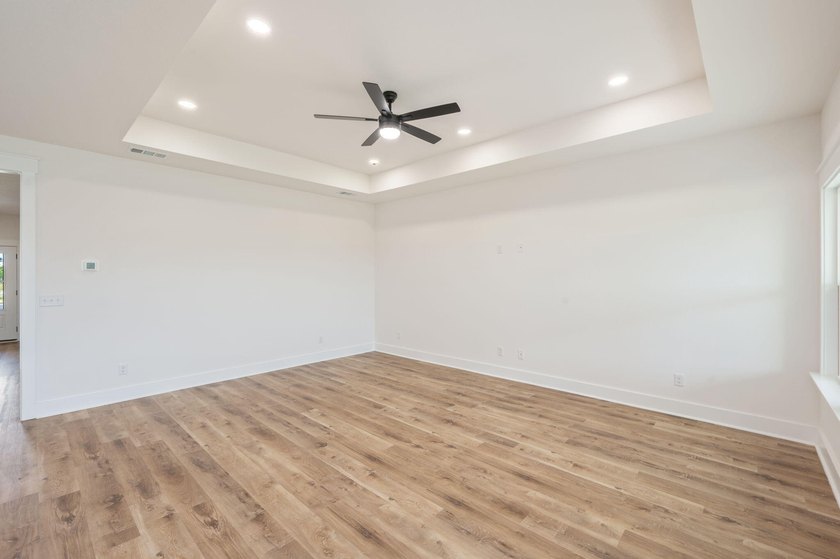 New construction 3BR/2BA home in Game Farm subdivision featuring - photo 8