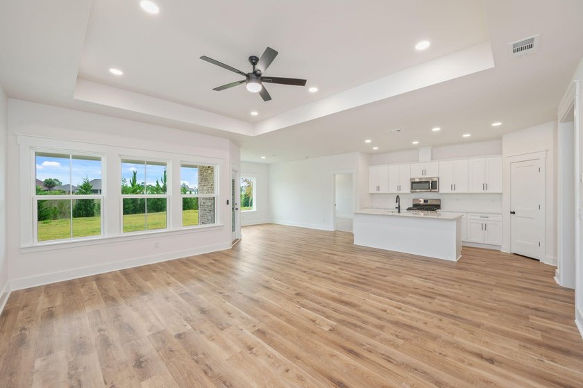 New construction 3BR/2BA home in Game Farm subdivision featuring - photo 10