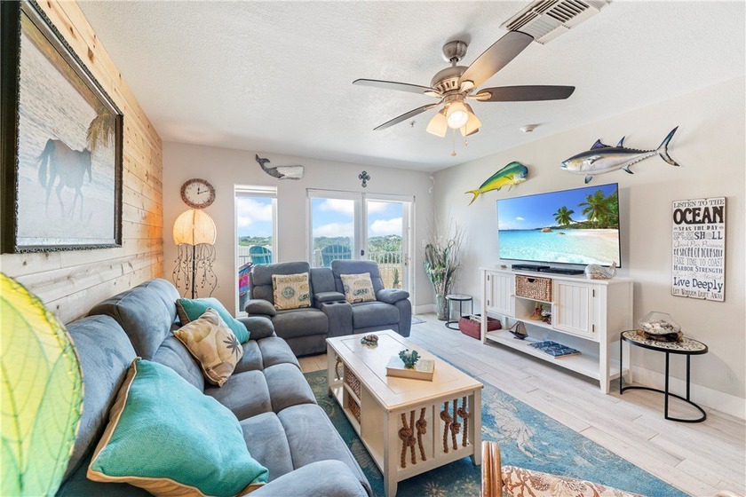 BEACHFRONT BEAUTY! Fabulously updated, this spacious 3-bedroom - photo 16