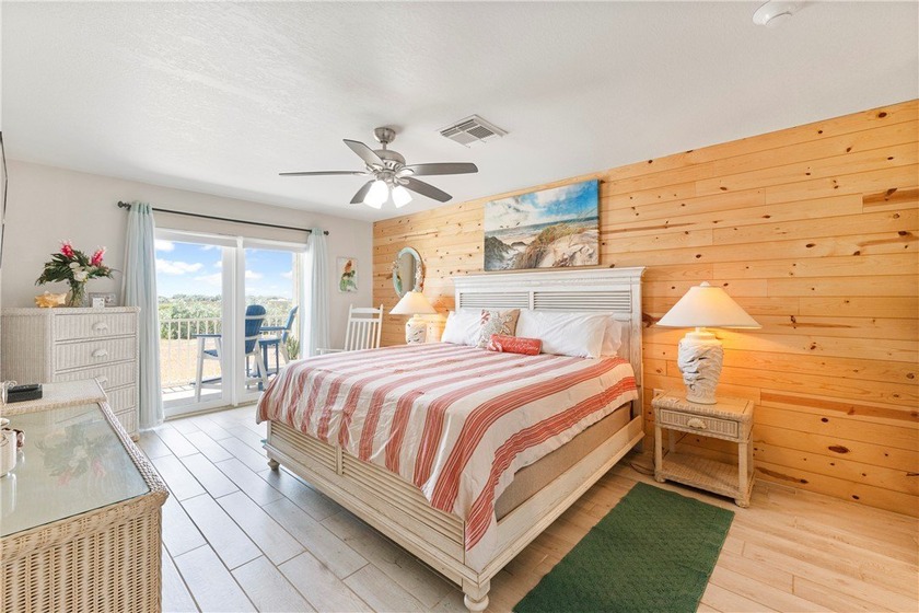 BEACHFRONT BEAUTY! Fabulously updated, this spacious 3-bedroom - photo 19