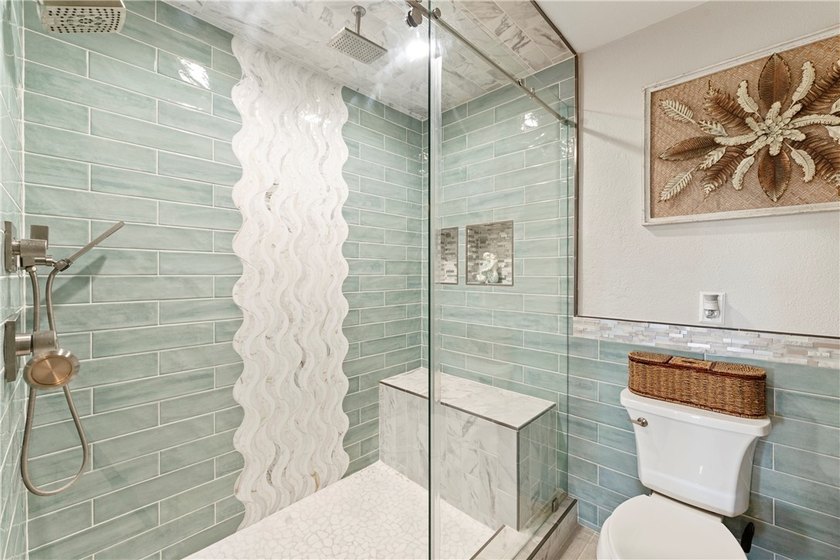 BEACHFRONT BEAUTY! Fabulously updated, this spacious 3-bedroom - photo 23