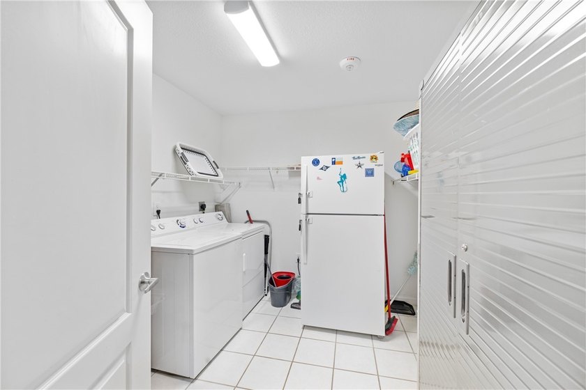 BEACHFRONT BEAUTY! Fabulously updated, this spacious 3-bedroom - photo 25