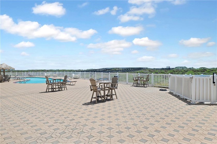 BEACHFRONT BEAUTY! Fabulously updated, this spacious 3-bedroom - photo 28