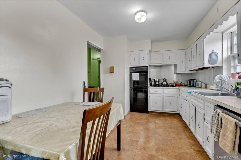 36-11 Utopia Parkway is a detached brick legal 2-family home - photo 11