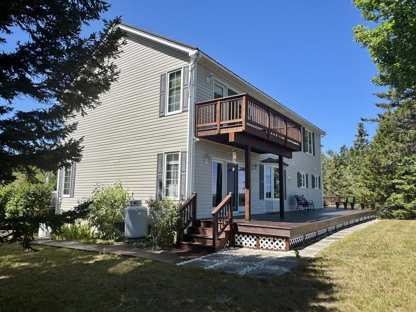 Situated in a spectacular rock-bound oceanfront setting, this - photo 12