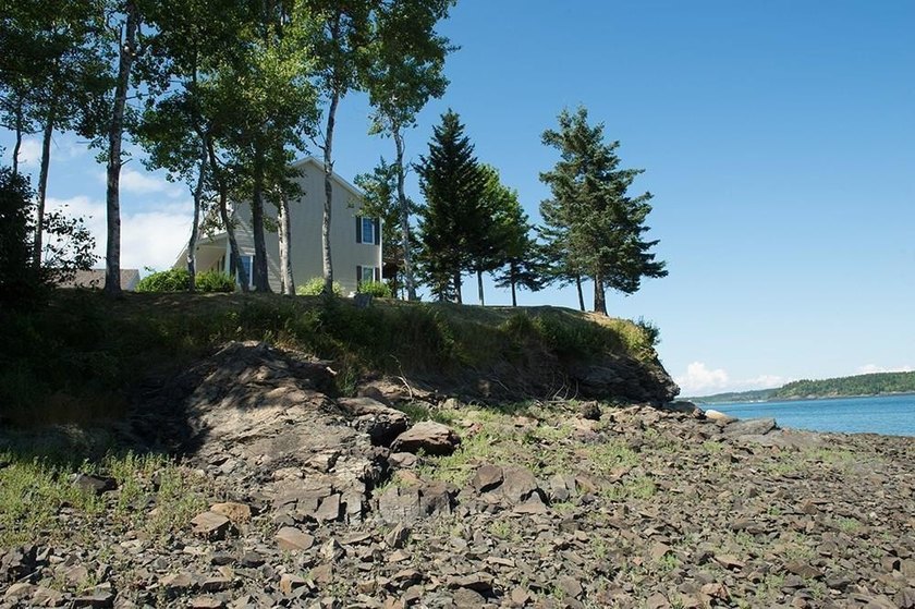 Situated in a spectacular rock-bound oceanfront setting, this - photo 22