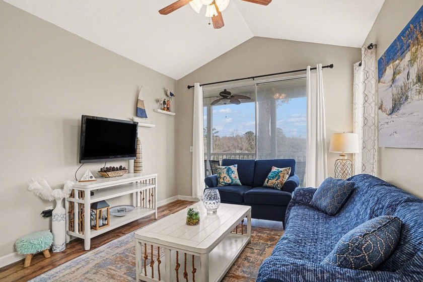 Enjoy comfortable coastal living in this charming two-bedroom - photo 3