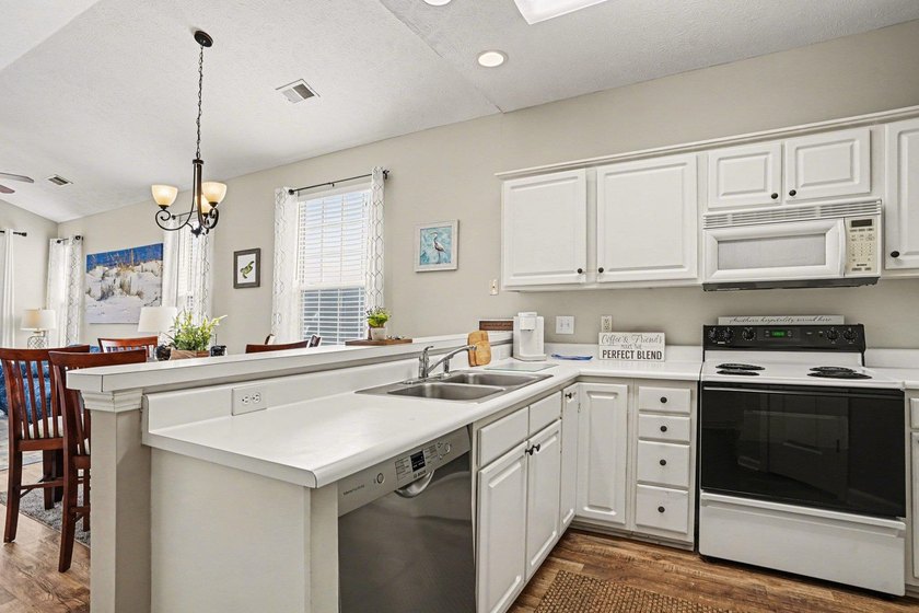 Enjoy comfortable coastal living in this charming two-bedroom - photo 9