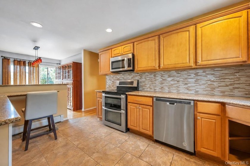 Welcome to 16 E Grove Street in Massapequa - a spacious and - photo 10
