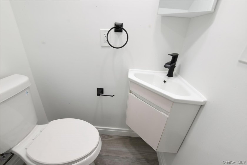 This colonial home has been extensively renovated and features a - photo 11