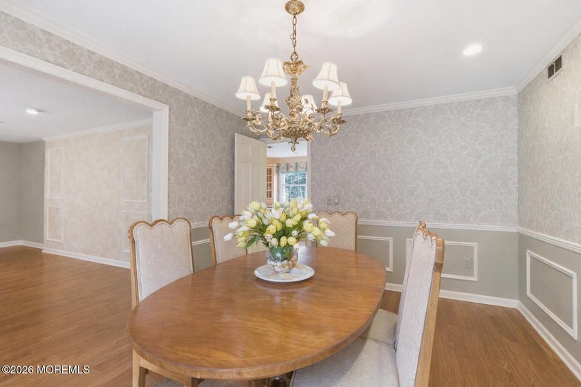 Welcome to this spacious 6-bedroom, 4.5-bath home offering over - photo 12