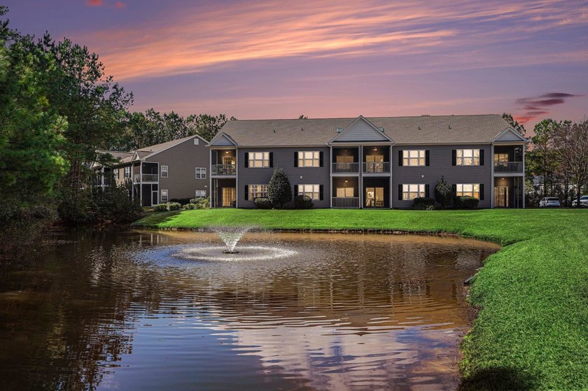 Welcome to 1141 Peace Pipe Place (Unit 201) in the gated - photo 2