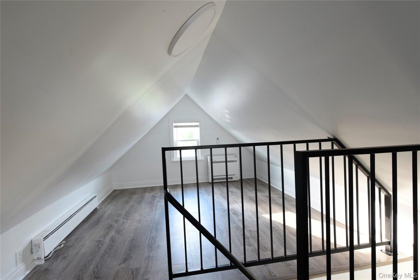 This colonial home has been extensively renovated and features a - photo 22