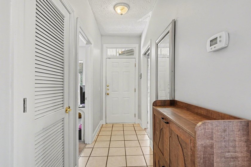 Welcome to 1141 Peace Pipe Place (Unit 201) in the gated - photo 4