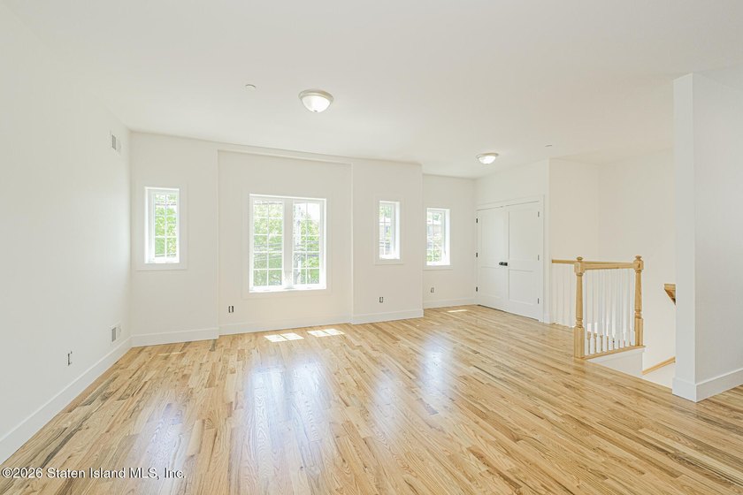 An exceptional new construction 6/6 two-family home offering 2 - photo 23