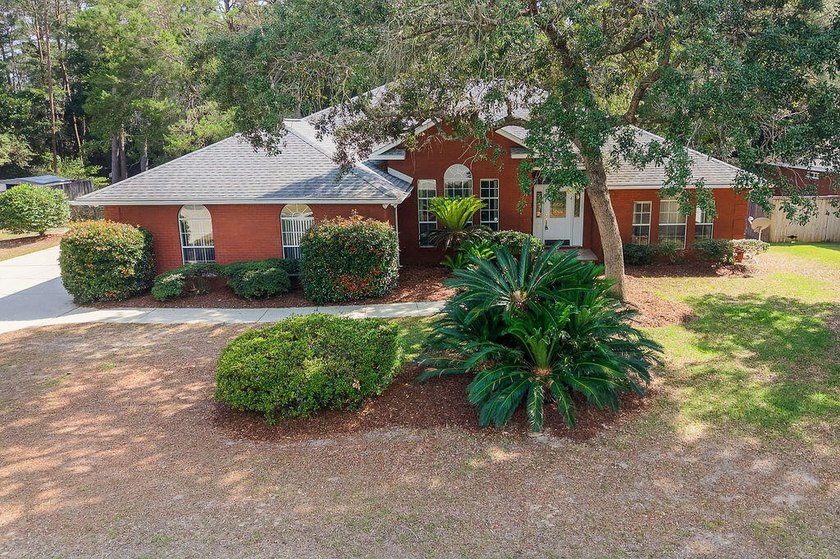 Located in the highly sought-after community of Niceville, this - photo 2