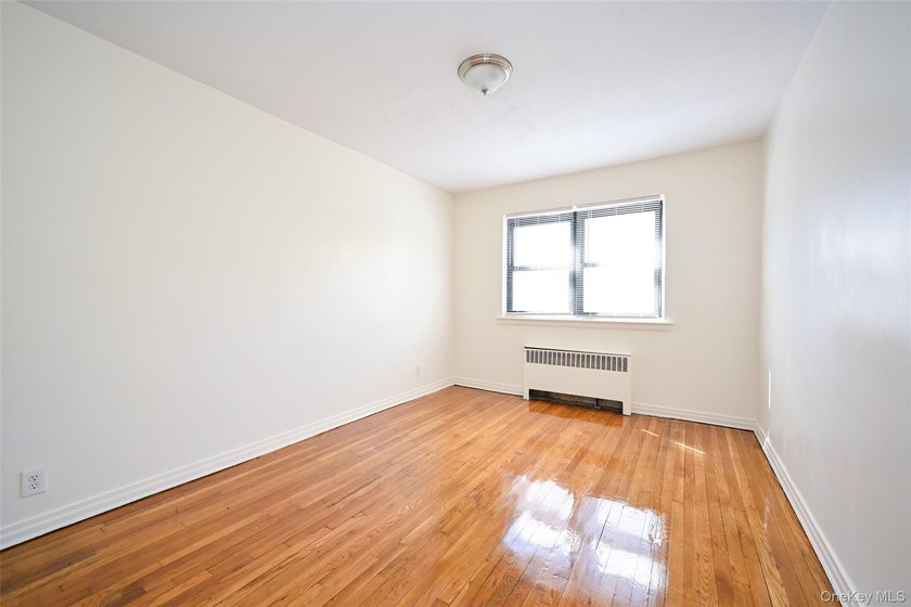 Semi-detached brick 2-family in prime Flushing, across from - photo 14