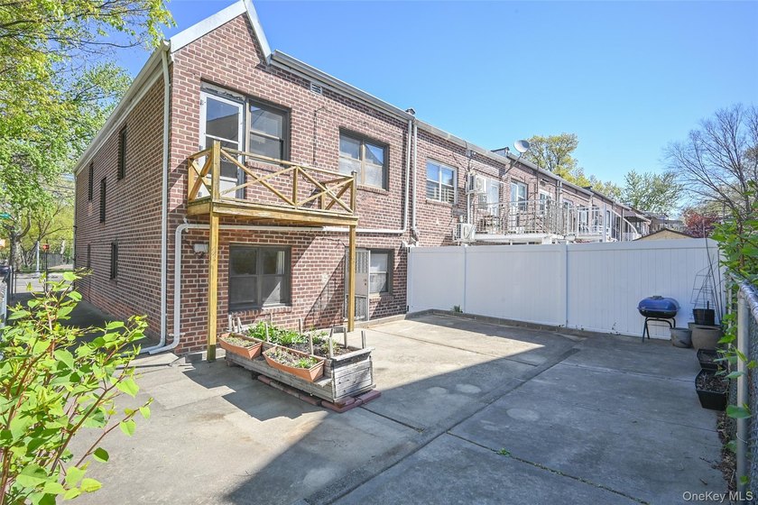 Semi-detached brick 2-family in prime Flushing, across from - photo 17