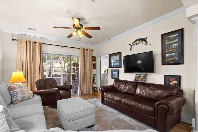 Beautifully positioned within Barefoot Resort &amp; Golf, this - photo 11
