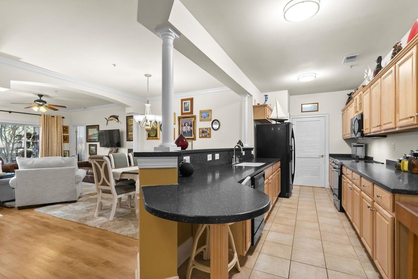 Beautifully positioned within Barefoot Resort &amp; Golf, this - photo 18