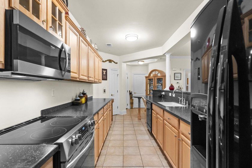 Beautifully positioned within Barefoot Resort &amp; Golf, this - photo 22