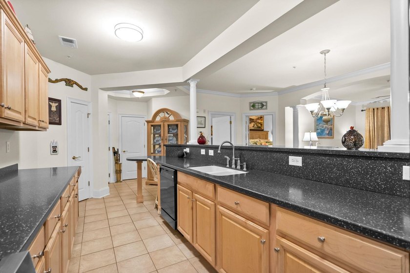 Beautifully positioned within Barefoot Resort &amp; Golf, this - photo 23