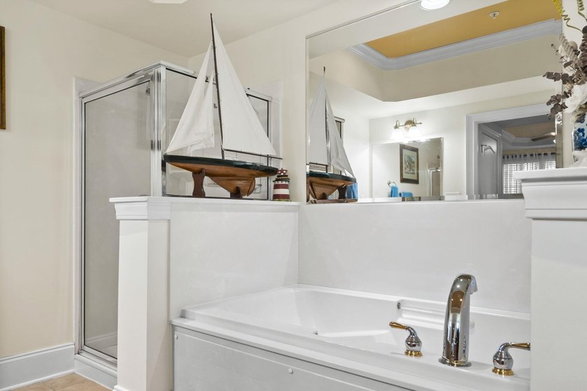 Beautifully positioned within Barefoot Resort &amp; Golf, this - photo 32