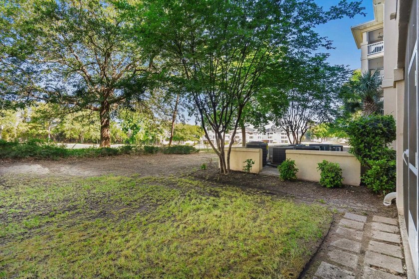 Beautifully positioned within Barefoot Resort &amp; Golf, this - photo 41