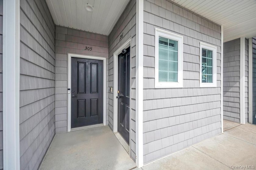 Welcome to maintenance-free living at 305 Okeefe Court in - photo 3