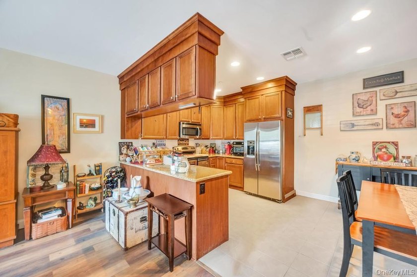 Welcome to maintenance-free living at 305 Okeefe Court in - photo 10