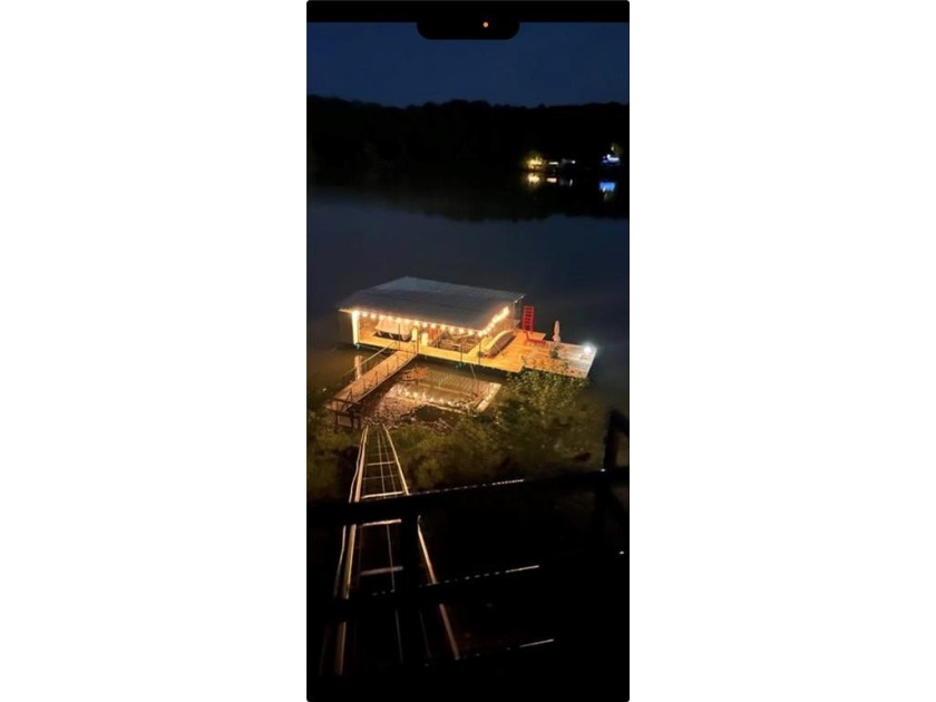 Indulge in waterfront living on approximately 5 serene acres at - photo 3