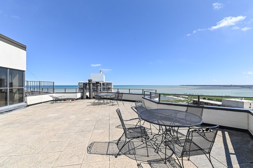 Experience elevated city living in this beautifully maintained - photo 20