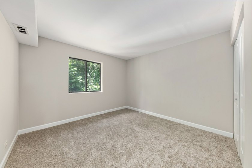 *** Beautifully updated third-floor end unit offering privacy - photo 11