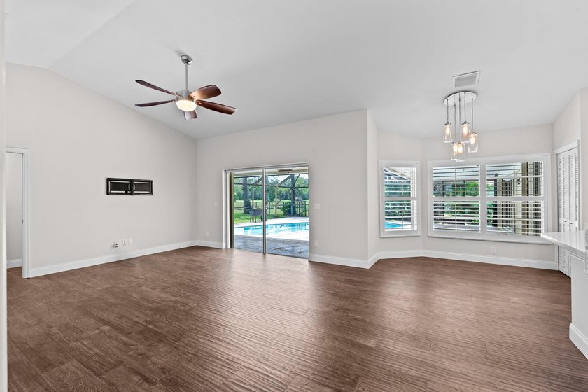 Welcome to this spacious single-story pool home in the - photo 21