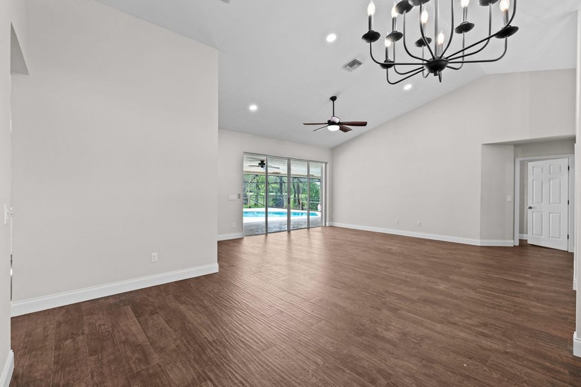 Welcome to this spacious single-story pool home in the - photo 24