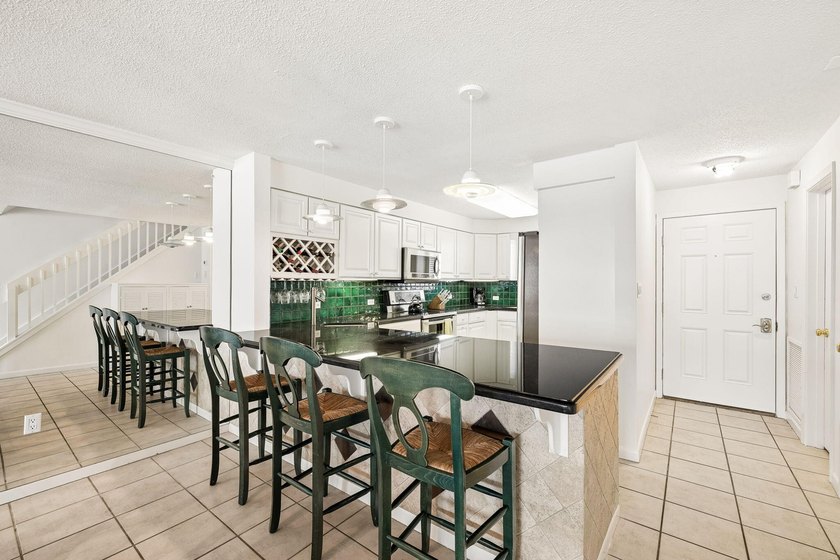 Experience exceptional beachfront living from this beautifully - photo 7
