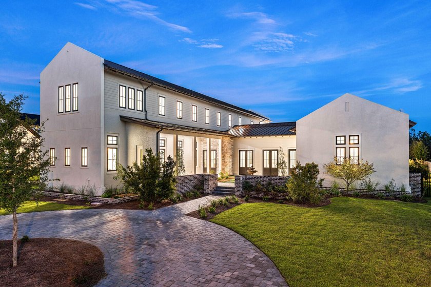 A showstopper of modern coastal elegance, 36 Sandcord Drive is a - photo 4