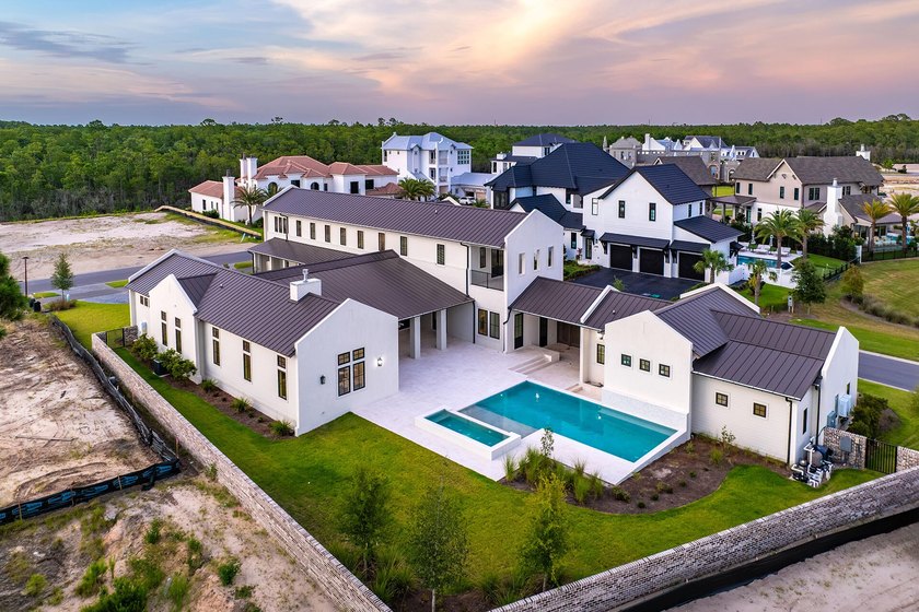 A showstopper of modern coastal elegance, 36 Sandcord Drive is a - photo 6