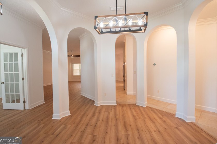 Beautiful well maintained home in Osprey Cove with brand new LVP - photo 7