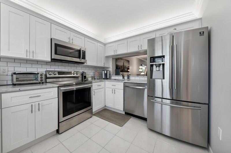 Totally renovated, updated condo detailed in beautiful neutral - photo 11