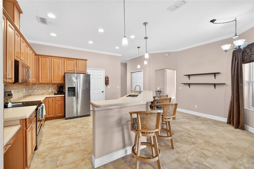 Experience resort-style living in this stunning 4-bedroom - photo 8