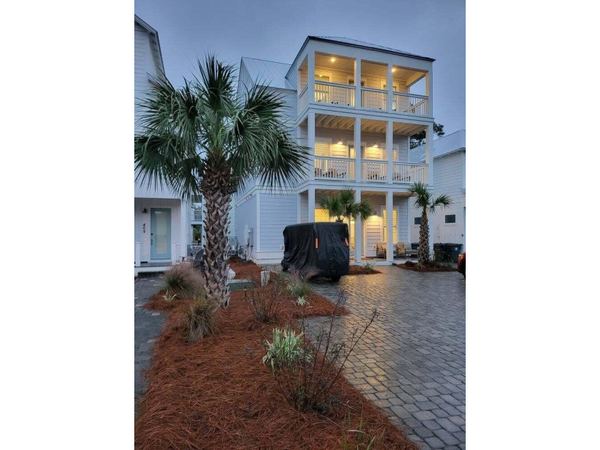 Stunning three-story beach home located less than half a mile - photo 2