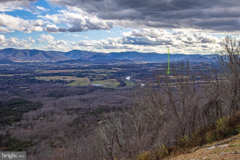 Discover the possibilities on Riverbend Drive. Tucked within a - photo 3