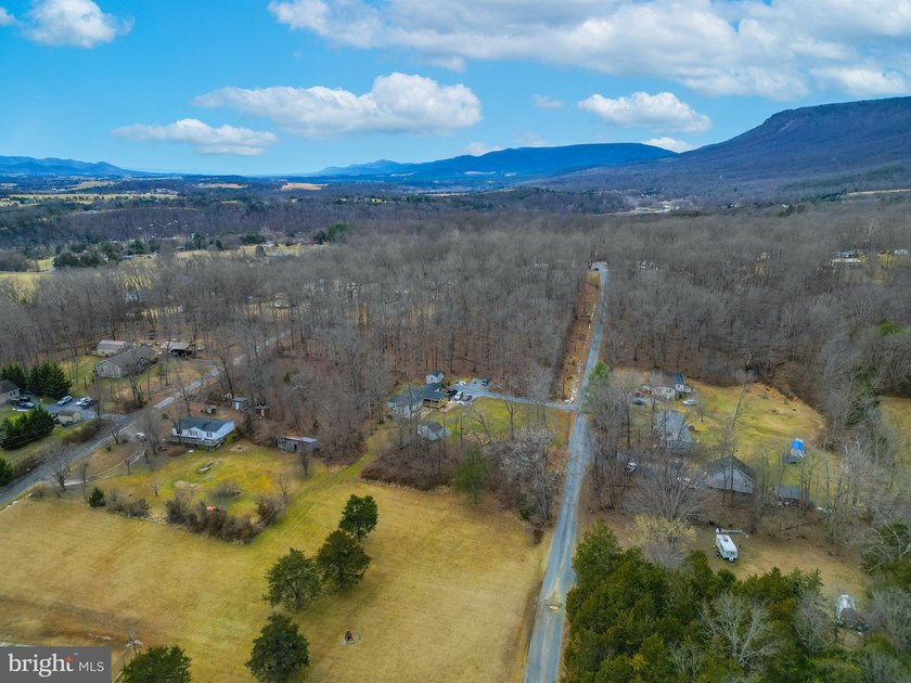 Discover the possibilities on Riverbend Drive. Tucked within a - photo 6