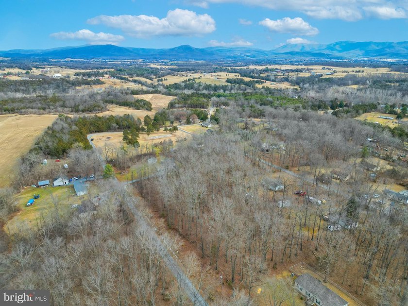 Discover the possibilities on Riverbend Drive. Tucked within a - photo 8