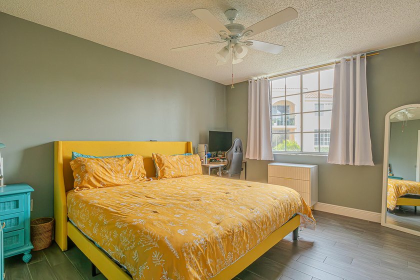 Step into this updated first-floor condo perfectly situated in - photo 11