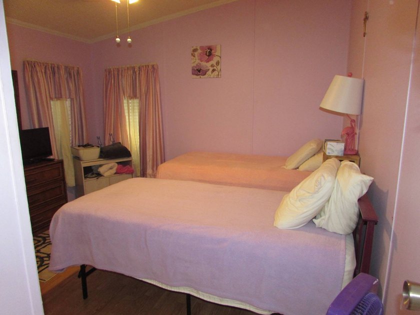 Furnished two bed two bath with rear deck on the pond . Extra - photo 22